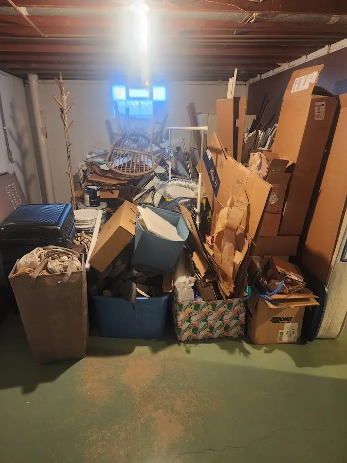 Roll-off dumpster container at job site for 6 Yard Dumpster Rental in Hastings